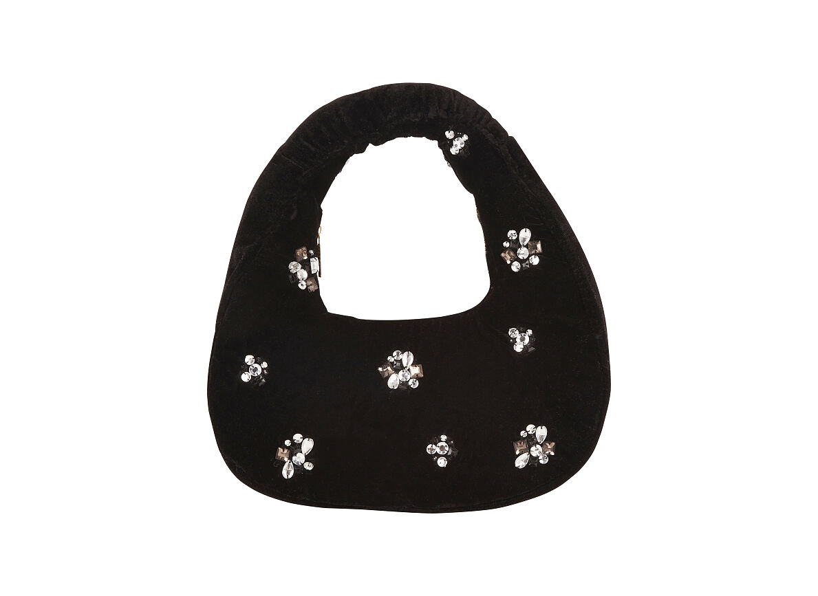 TK Maxx - Schwarze Samttasche €24,99